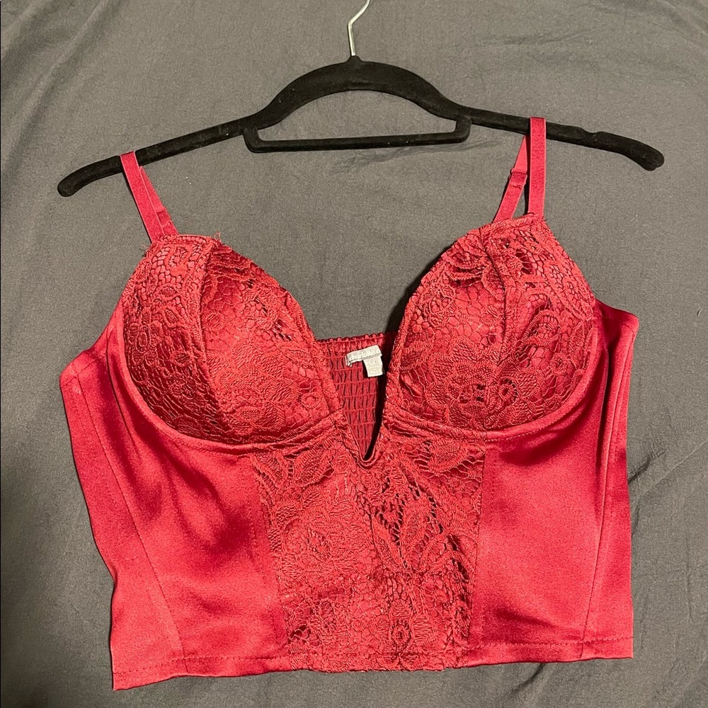 Red cropped corset with lace designs
